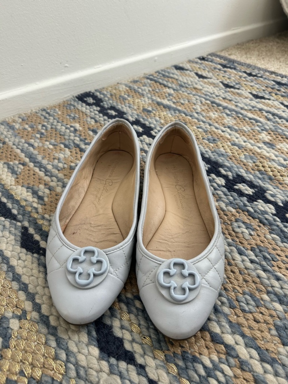 Quilted Light Gray Leather Ballet Flats with Decorative Emblem